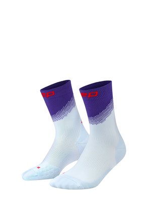 Pair of white athletic socks with purple tops and red text detailing, displayed on a white background.
