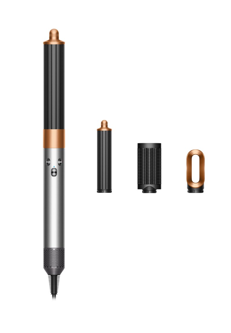 Strumento per lo styling dei capelli con corpo metallico argentato, manico nero testurizzato e dettagli in rame. Include un cilindro e accessori diffusori removibili.