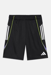 Mustard värvi sportlikud lühikesed püksid valgete triipudega külgedel, neoonrohelise äärisega, lillakate aktsentidega ning valge Adidas logo ees paremal jalal.