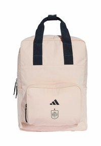 Zaino rosa con dettagli neri, dotato di due manici superiori, tasca frontale con zip e logo stampato di Adidas con lo stemma della Spagna.