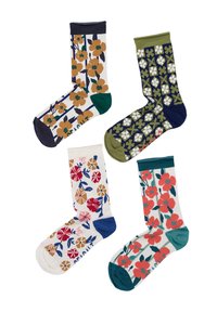 Quattro calzini colorati con fantasia floreale, con tallone, punta e risvolto in tonalità di verde, blu navy, blu e turchese su sfondo bianco.