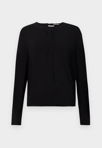 Haut noir à manches longues avec une texture côtelée, encolure ronde et détails plissés à l'avant, offrant une coupe décontractée.