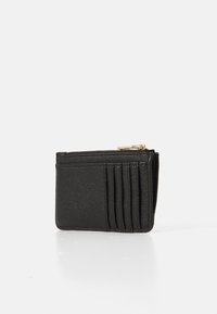 Black leather wallet with multiple card slots, zip closure, textured surface, and gold-tone hardware accents. Compact rectangular shape.