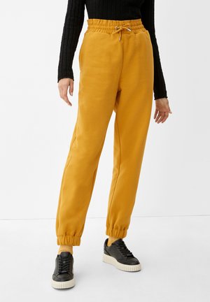 MIT PAPERBAG BUND - Tracksuit bottoms - gelb