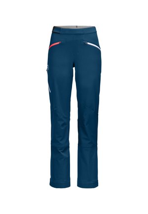Navy blue outdoor pants with a smooth texture, featuring red and white zipper accents, and a tapered cut at the ankles.