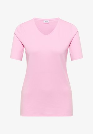 Haut rose clair à manches courtes pour femmes avec col en V et coupe ajustée, doté d'une petite étiquette en tissu à l'intérieur du col.