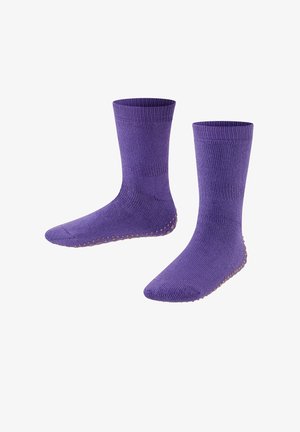 Chaussettes violettes en tissu texturé avec un design côtelé. Le dessous est doté de petites grippeuses rondes en caoutchouc pour une meilleure résistance au glissement.