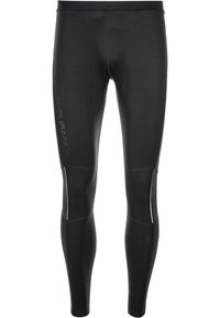 Svarta atletiska leggings med en tight passform, gjorda av stretchmaterial, med en präglad logotyp och kontrasterande vit sömnad.