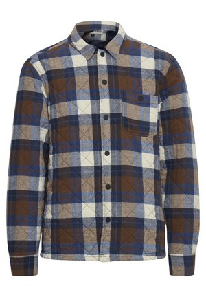 Chemise en flanelle à carreaux marron, bleu et crème avec un col boutonné, des manches longues et une poche poitrine unique. Tissu texturé avec des motifs subtils.