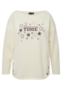 Crème-kleurige sweatshirt met een ontspannen pasvorm, voorzien van een 'Dreaming TIME' graphic in donkerbruin en sterrenpatronen aan de zijkanten.