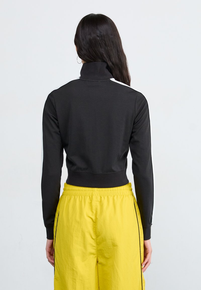 Puma FUTURE ARCHIVE SLIM CROPPED - Sportovní bunda - black/white