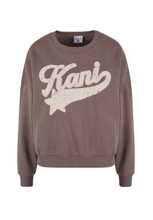 Sweatshirt maro cu decolteu rotund, având un mare logo alb uzat "Kani" și un grafic cu stea pe față. Mansete și tiv cu model în relief.