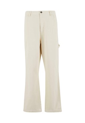 Pantalons beige à jambes larges en tissu mélangé coton avec fermeture à bouton. Dotés de poches latérales et d'une texture subtile. Détails de couture visibles.