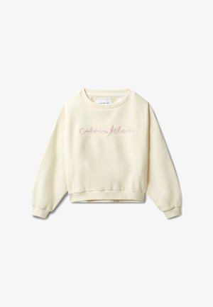 Kremowa bluza z długim rękawem i okrągłym dekoltem z napisem "Calvin Klein" w jasnoróżowej kursywie na przedzie, z ściągaczami przy rękawach i u dołu.