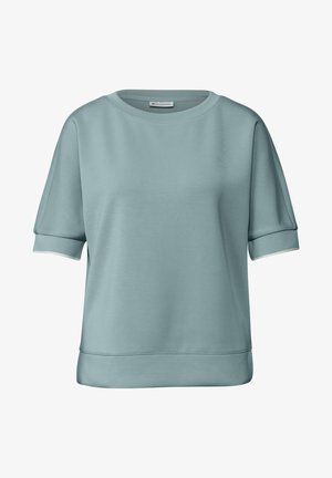 Sweat-shirt à manches courtes bleu clair en matériau doux, avec un col rond et des bordures blanches aux manches et à la taille. Texture lisse.