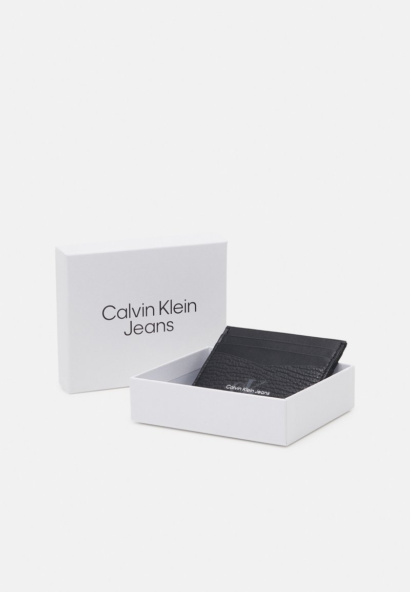 Herren Geldbörsen | Calvin Klein Jeans MONO TEXTURED CARDCASE UNISEX Geldbörse black/schwarz - OV09023 Herren Geldbörsen | Calvin Klein Jeans MONO TEXTURED CARDCASE UNISEX Geldbörse black/schwarz - OV09023