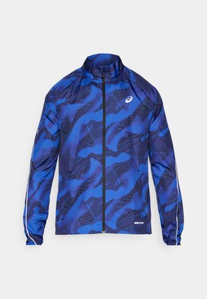 Giacca blu con zip e motivo a fantasia, dotata di un colletto alto, design in rete, polsini elasticizzati e dettagli riflettenti sulle maniche.