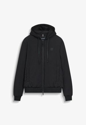 Zwarte gewatteerde rits-hoodie met voorzakken, capuchon met trekkoord, ribbekanten en tailleband, met een klein logo-opdruk op de borst.