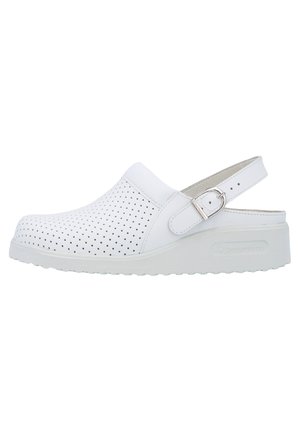 White perforated clogs with a back strap, featuring a rounded toe and a textured rubber sole for grip. Adjustable buckle accent.