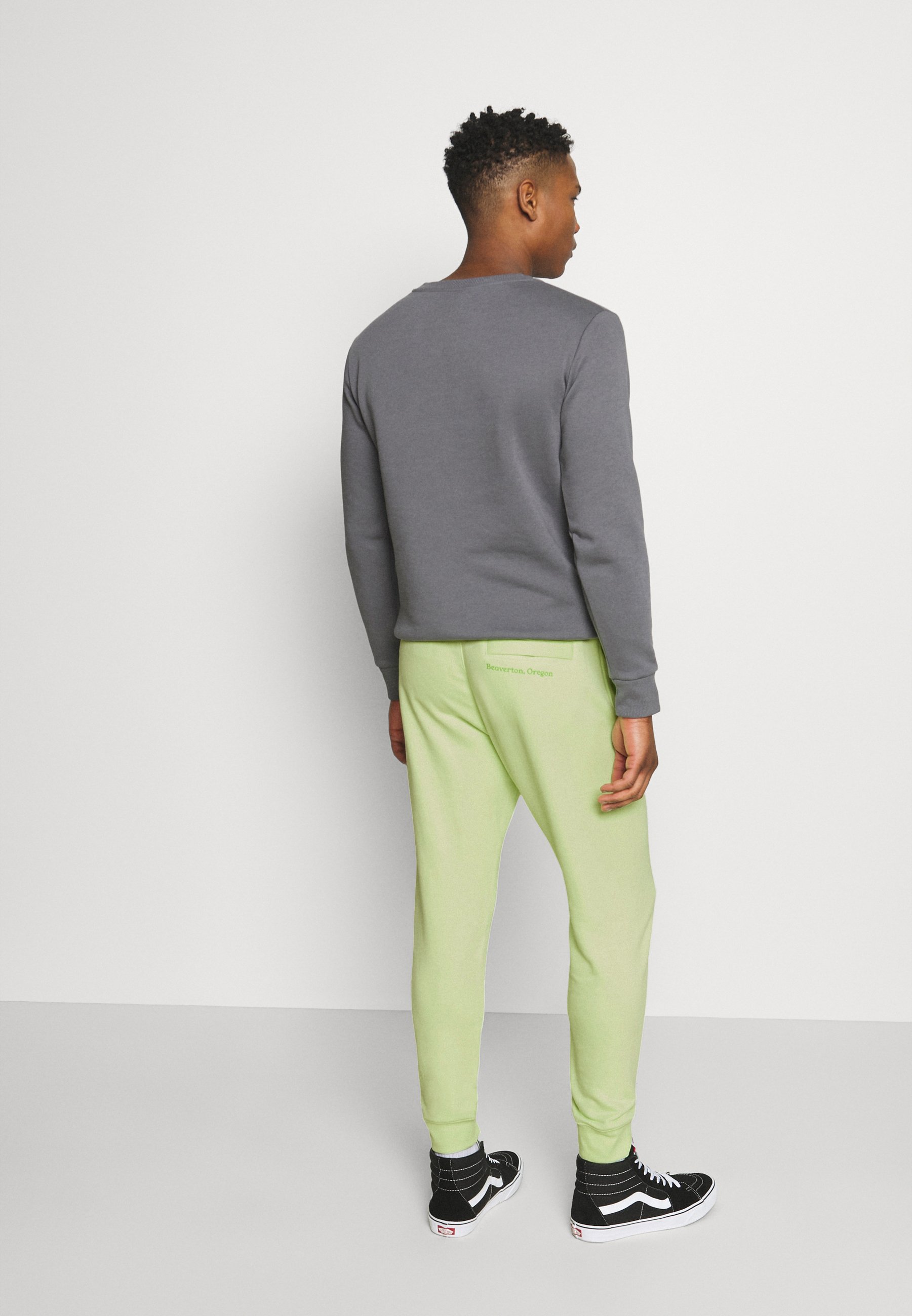 Nike Sportswear PANT - Pantaloni sportivi - liquid lime/giallo fluo -  Zalando.it
