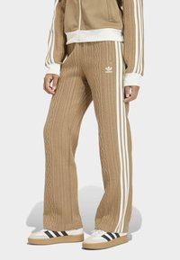 CLASSIC - Tracksuit bottoms - cardboard
