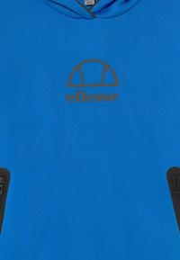 Blue sweatshirt with a hood, featuring a black "ellesse" logo and two zippered side pockets with black accents. Smooth texture throughout.
