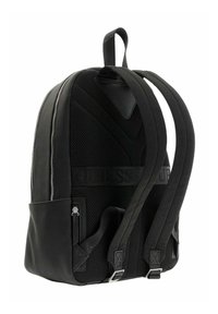 Black backpack with mesh and synthetic leather materials, featuring adjustable straps, a front zip pocket, and structured design.