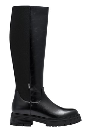 Botte noire montante jusqu’au genou avec semelle épaisse, devant en cuir lisse, dos en tissu élastique et petite étiquette de marque sur le côté.