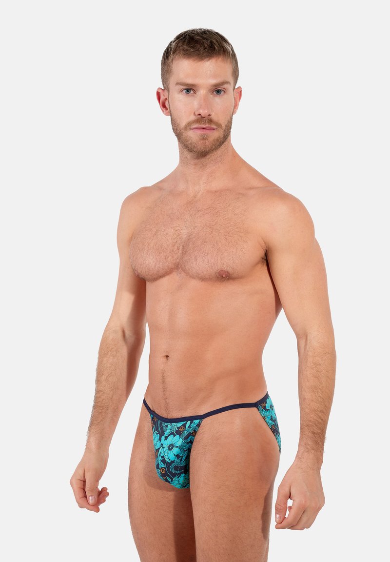 Musterte Schwimmslips mit blauem Blumendesign auf navy Hintergrund, aus leichtem Stoff gefertigt mit schmalem, kontrastierendem Bund.