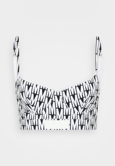 Black and white patterned bralette featuring large, repeating "M" letters. Fabric has a smooth texture with adjustable straps and a band.