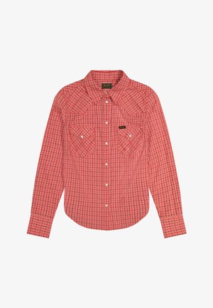 Punase ja valge ruuduline pika varrukaga nööbitav särk kahe esiküljel oleva nööbitava tasku ning terava kraega.