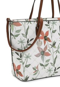 Sac fourre-tout à imprimé floral avec un extérieur texturé blanc et des accents roses et verts. Poignées en cuir marron et détails en métal argenté.