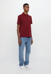 Michael Kors INTERLOCK ZIP  - Polo shirt - dark red