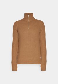 Brun ribbad tröja med hög krage och halv dragkedja. Tillverkad av vävt material, med långa ärmar och en figurnära nederkant.