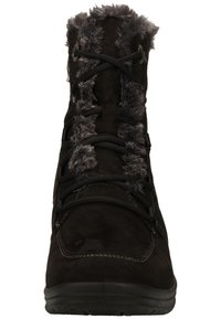 Botte en suède noire avec bordure en fausse fourrure, à lacets et surface texturée. Caractéristiques : bout rond et petit talon en caoutchouc pour plus de stabilité.
