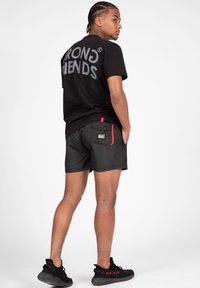 Wrong Friends LUGO - Shorts - black