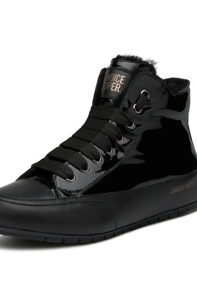 Black high-top sneaker made of glossy patent leather with faux fur lining, flat black laces, and silver eyelets. Brand name embossed on side.