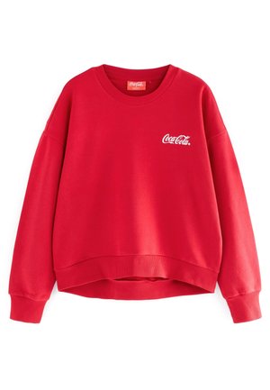 Sweatshirt rouge en mélange de coton, avec un col rond, des manches longues et le logo Coca-Cola en blanc sur la poitrine gauche.