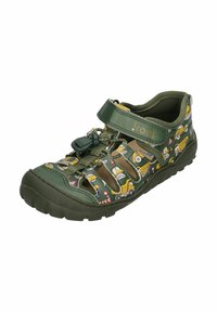 Green children's sandal featuring cutouts and buckle closure, with a colorful construction vehicle pattern on the side. Rubber sole.