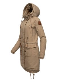 Beige parka jacket with a fur-lined hood, drawstrings, multiple pockets, and leather accents. Features a zippered front and ribbed cuffs.