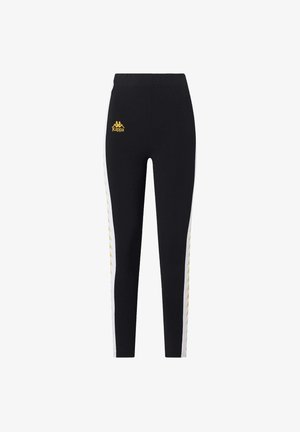 Leggings neri con una vita elastica, caratterizzati da pannelli laterali bianchi adornati da dettagli con logo giallo. Realizzati in un materiale elastico e liscio.