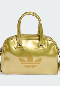 Gold synthetic handbag with two handles, zipper closure, and embossed logo on the front. Smooth, shiny texture with metal accents.