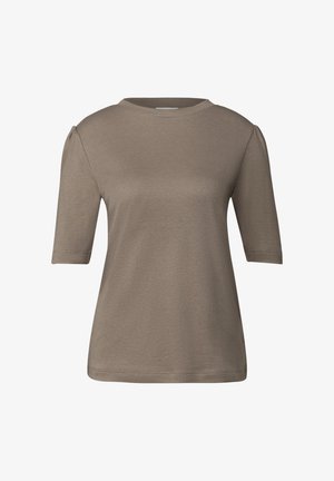 T-shirt beige a maniche corte realizzata in morbido cotone, con scollatura rotonda e delicati dettagli a spalla a palloncino, caratterizzata da una superficie liscia.