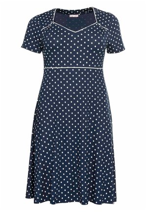 Marineblaues Kleid mit kurzen Ärmeln, weißen Punkten und weißem Besatz entlang des Ausschnitts und der Taille, knielang mit ausgestelltem Rock.
