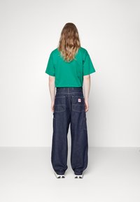Carhartt WIP NASH PANT SMITH - Relaxed fit -farkut - blue rinsed
