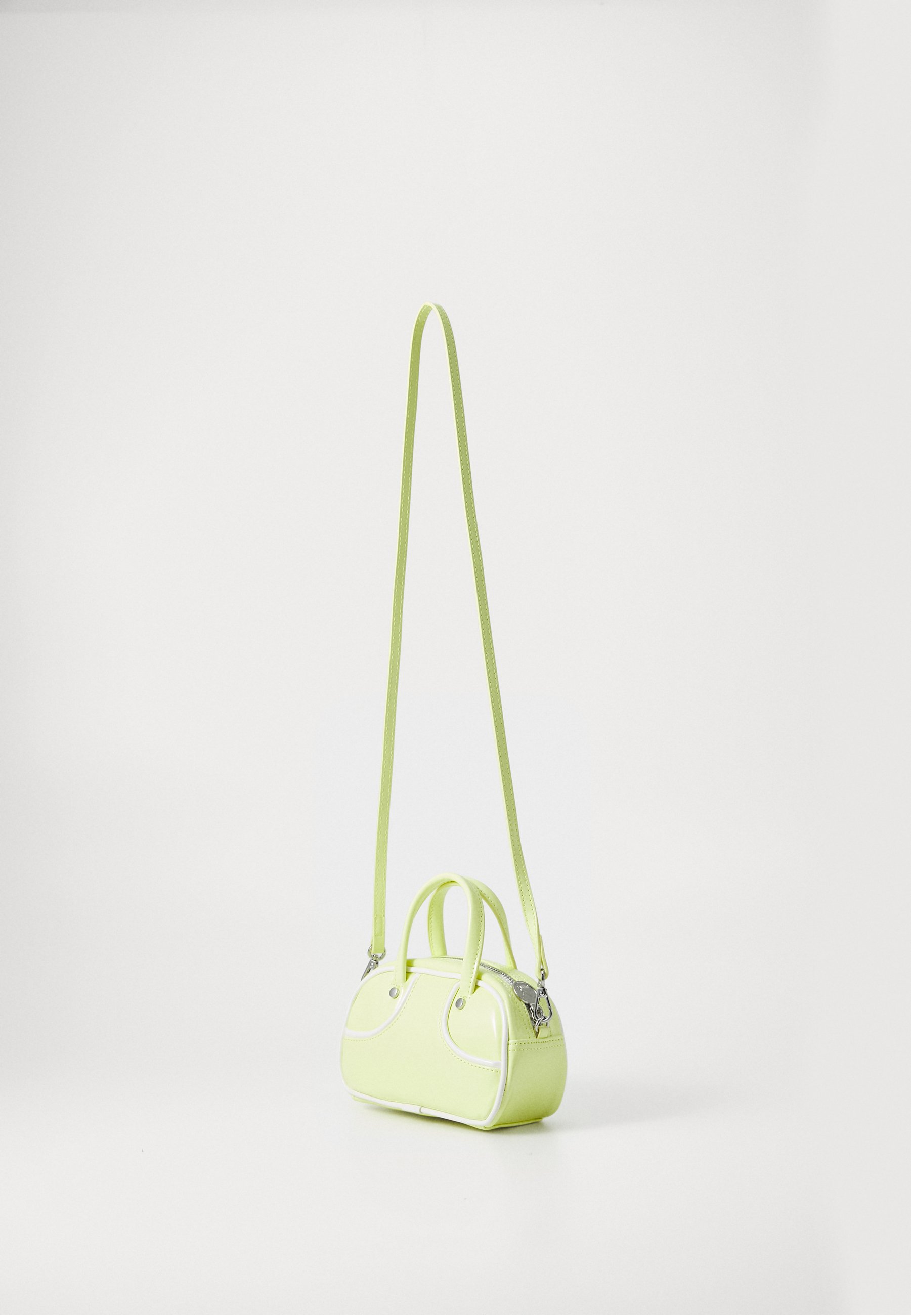 Puma PUMA 1976 MICRO GRIP BAG - Handbag - gold-coloured moon/white