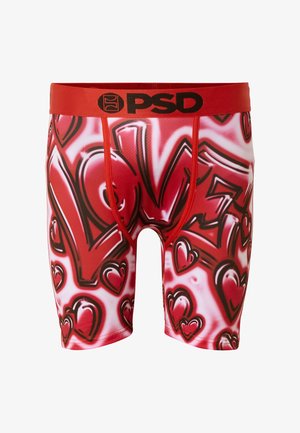 Bóxers rojos con texto estilo grafiti que dice "LOVE" y múltiples corazones rojos, con una cinturilla roja con el logo "PSD" en negro.