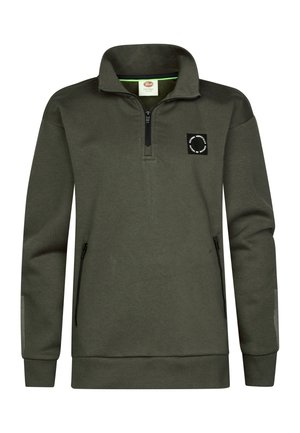 Pile verde scuro con mezza cerniera, maniche lunghe, due tasche laterali con cerniera e un piccolo logo tondo sul petto sinistro.