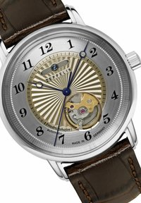 Automatic watch with silver and gold-tone dial featuring sunburst pattern, blue hands, black numerals, and brown leather strap.