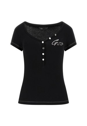 Črna rebrasta kratka majica s kratkimi rokavi in V-izrezom, ki vsebuje detajle s kavljicami in belo šivanim robom. Vključuje natisnjen logotip 'Guess EST 1981'.
